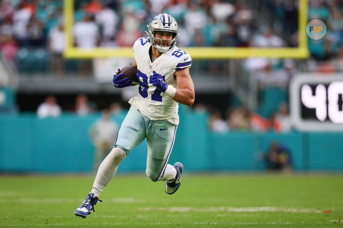 Dec 24, 2023; Miami Gardens, Florida, USA; Dallas Cowboys tight end Jake Ferguson (87) runs with the football against the Miami Dolphins during the first quarter at Hard Rock Stadium. Credit: Sam Navarro-USA TODAY Sports