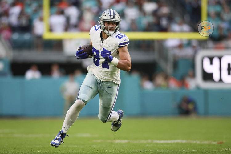 Dec 24, 2023; Miami Gardens, Florida, USA; Dallas Cowboys tight end Jake Ferguson (87) runs with the football against the Miami Dolphins during the first quarter at Hard Rock Stadium. Credit: Sam Navarro-USA TODAY Sports