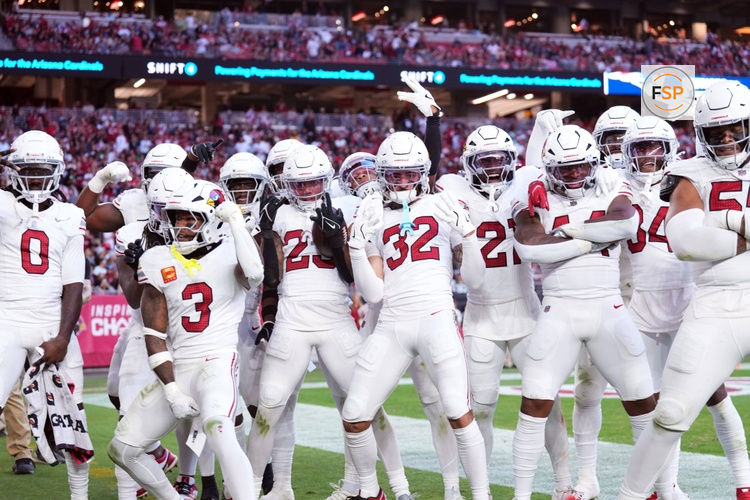 Dec 15, 2024; Glendale, Arizona, USA; Arizona Cardinals cornerback Sean Murphy-Bunting (23) celebrates an interception with teammates against the New England Patriots during the second half at State Farm Stadium. Credit: Joe Camporeale-Imagn Images