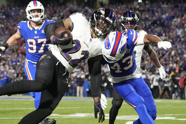 Sep 7, 2025; Orchard Park, New York, USA; Baltimore Ravens running back Derrick Henry (22) runs the ball during the second quarter against Buffalo Bills cornerback Dorian Strong (43) at Highmark Stadium. Mandatory Credit: Gregory Fisher-Imagn Images