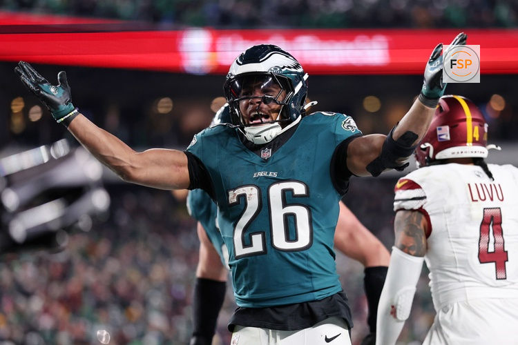 Jan 26, 2025; Philadelphia, PA, USA; Philadelphia Eagles running back Saquon Barkley (26) celebrates after a touchdown against the Washington Commanders during the second half in the NFC Championship game at Lincoln Financial Field. Credit: Bill Streicher-Imagn Images