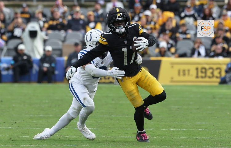 Oct 11, 2026; Pittsburgh, Pennsylvania, USA;  Pittsburgh Steelers wide receiver Germie Bernard (17) runs with the ball after a catch while defended by Indianapolis Colts safety Cam Bynum (0) in the fourth quarter at Acrisure Stadium.  Credit: Charles LeClaire-Imagn Images