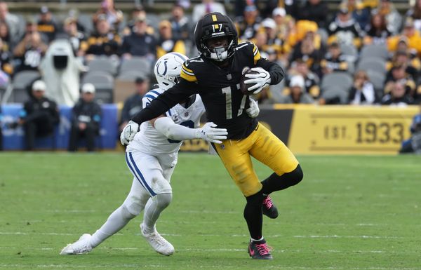 Oct 11, 2026; Pittsburgh, Pennsylvania, USA;  Pittsburgh Steelers wide receiver Germie Bernard (17) runs with the ball after a catch while defended by Indianapolis Colts safety Cam Bynum (0) in the fourth quarter at Acrisure Stadium.  Mandatory Credit: Charles LeClaire-Imagn Images