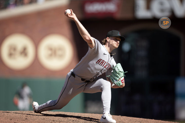 May 14, 2025; San Francisco, California, USA; Arizona Diamondbacks pitcher Shelby Miller (18) delivers a pitch against the San Francisco Giants during the ninth inning at Oracle Park. Credit: D. Ross Cameron-Imagn Images