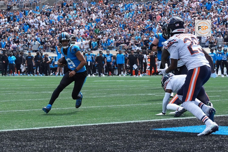 Sep 13, 2026; Charlotte, North Carolina, USA;  Carolina Panthers quarterback Bryce Young (9) runs the ball for a touchdown in the second quarter against the Chicago Bears at Bank of America Stadium.  Credit: Jim Dedmon-Imagn Images