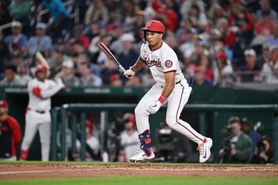 Apr 22, 2026; Washington, District of Columbia, USA;  Washington Nationals outfielder Daylen Lile (4) bats against the Atlanta Braves at Nationals Park. Mandatory Credit: Jamie Sabau-Imagn Images