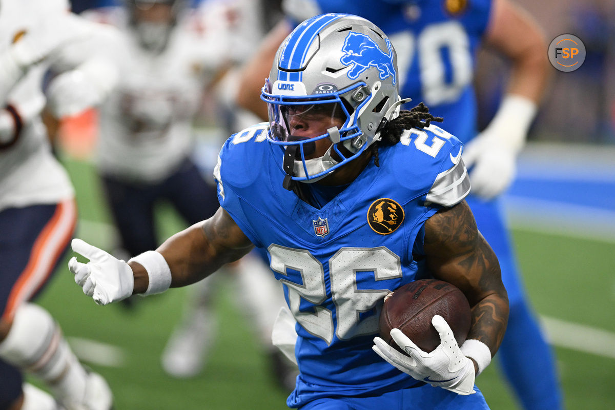 Nov 28, 2024; Detroit, Michigan, USA; Detroit Lions running back Jahmyr Gibbs (26) runs the ball against the Chicago Bears in the first quarter at Ford Field. Credit: Lon Horwedel-Imagn Images