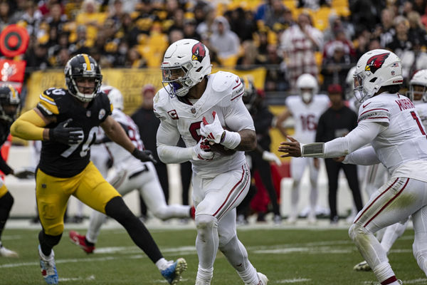 PITTSBURGH, PA - DECEMBER 03:  Arizona Cardinals quarterback Kyler Murray (1) passes the ball to Arizona Cardinals running back James Conner (6) during the first half of the game between the Pittsburgh Steelers and the Arizona Cardinals at Acrisure Stadium in Pittsburgh, PA on December 3, 2023. (Photo by Shelley Lipton/Icon Sportswire)