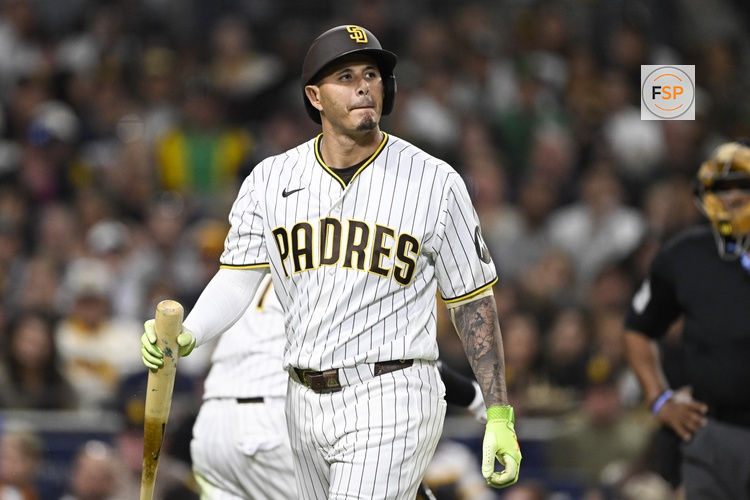 May 23, 2026; San Diego, California, USA; San Diego Padres third baseman Manny Machado (13) walks back to the dugout after striking out during the fifth inning against the Athletics at Petco Park. Credit: Denis Poroy-Imagn Images