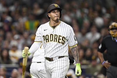 May 23, 2026; San Diego, California, USA; San Diego Padres third baseman Manny Machado (13) walks back to the dugout after striking out during the fifth inning against the Athletics at Petco Park. Mandatory Credit: Denis Poroy-Imagn Images
