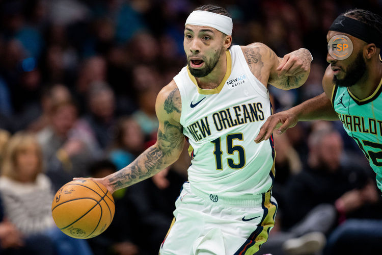 Jan 25, 2025; Charlotte, North Carolina, USA; New Orleans Pelicans guard Jose Alvarado (15) drives the ball against the Charlotte Hornets during the third quarter at Spectrum Center. Credit: Scott Kinser-Imagn Images