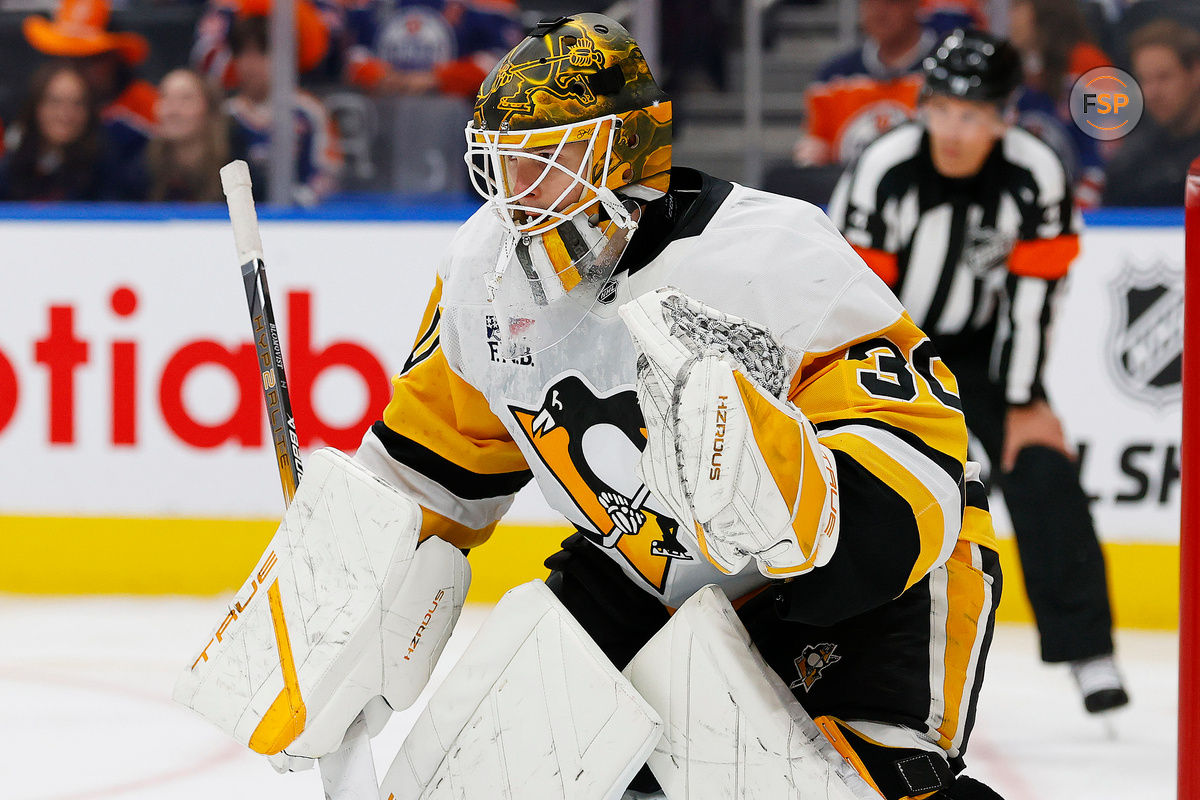 Oct 25, 2024; Edmonton, Alberta, CAN; Pittsburgh Penguins goaltender Joel Blomqvist (30) follows the play against the Edmonton Oilers at Rogers Place. Credit: Perry Nelson-Imagn Images