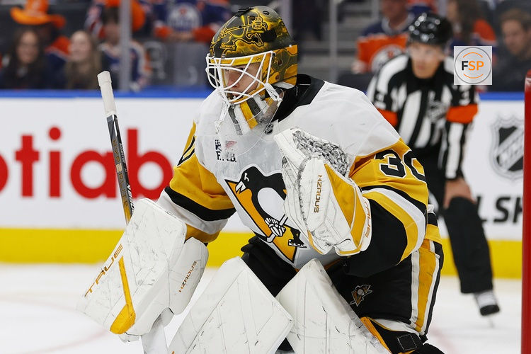 Oct 25, 2024; Edmonton, Alberta, CAN; Pittsburgh Penguins goaltender Joel Blomqvist (30) follows the play against the Edmonton Oilers at Rogers Place. Credit: Perry Nelson-Imagn Images
