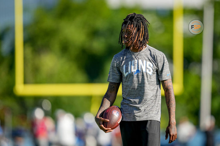 ALLEN PARK, MICHIGAN - JULY 29: Jameson Williams #18 of the Detroit Lions looks on during the Detroit Lions Training Camp at the Lions Headquarters and Training Facility on July 29, 2022 in Allen Park, Michigan. (Photo by Nic Antaya/Getty Images)