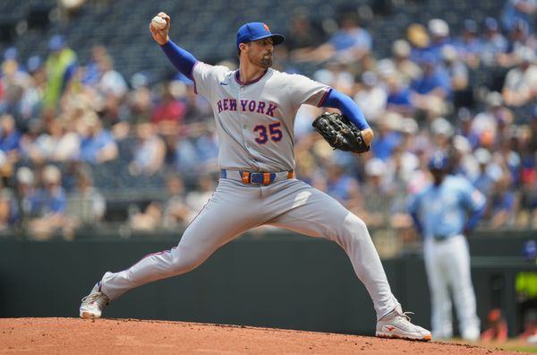 Jul 13, 2025; Kansas City, Missouri, USA; New York Mets starting pitcher Clay Holmes (35) pitches during the first inning against the Kansas City Royals at Kauffman Stadium. Mandatory Credit: Jay Biggerstaff-Imagn Images