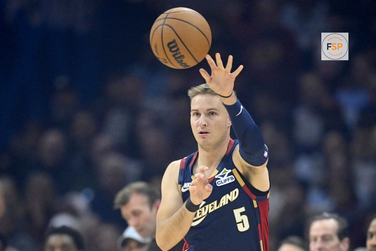 Nov 5, 2025; Cleveland, Ohio, USA; Cleveland Cavaliers guard Sam Merrill (5) throws a pass in the first quarter against the Philadelphia 76ers at Rocket Arena. Credit: David Richard-Imagn Images