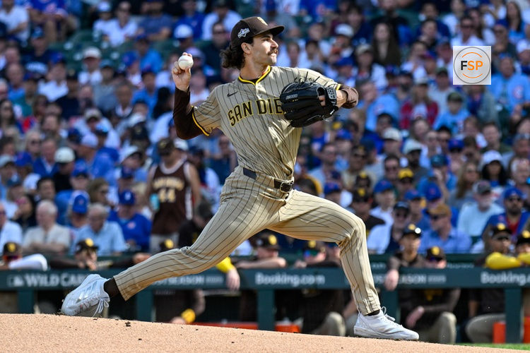 Oct 1, 2025; Chicago, Illinois, USA; San Diego Padres starting pitcher Dylan Cease (84) delivers a pitch against the Chicago Cubs in the first inning during game two of the Wildcard round for the 2025 MLB playoffs at Wrigley Field. Credit: Matt Marton-Imagn Images