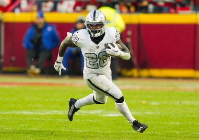 Nov 29, 2024; Kansas City, Missouri, USA; Las Vegas Raiders running back Sincere McCormick (28) during the second half against the Kansas City Chiefs at GEHA Field at Arrowhead Stadium. Mandatory Credit: Jay Biggerstaff-Imagn Images