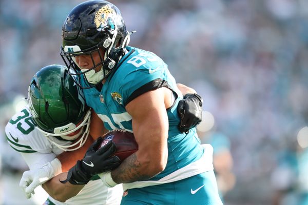 Dec 14, 2025; Jacksonville, Florida, USA; New York Jets safety Dean Clark (35) tackles Jacksonville Jaguars tight end Brenton Strange (85) during the third quarter at EverBank Stadium. Mandatory Credit: Morgan Tencza-Imagn Images