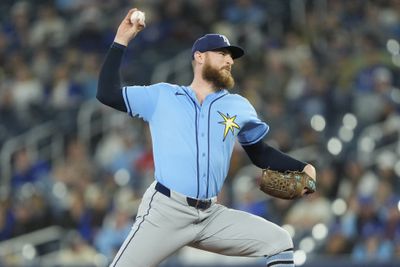 May 11, 2026; Toronto, Ontario, CAN; Tampa  Bay Rays pitcher Bryan Baker (47) pitches to the Toronto Blue Jays during the ninth inning at Rogers Centre. Mandatory Credit: John E. Sokolowski-Imagn Images