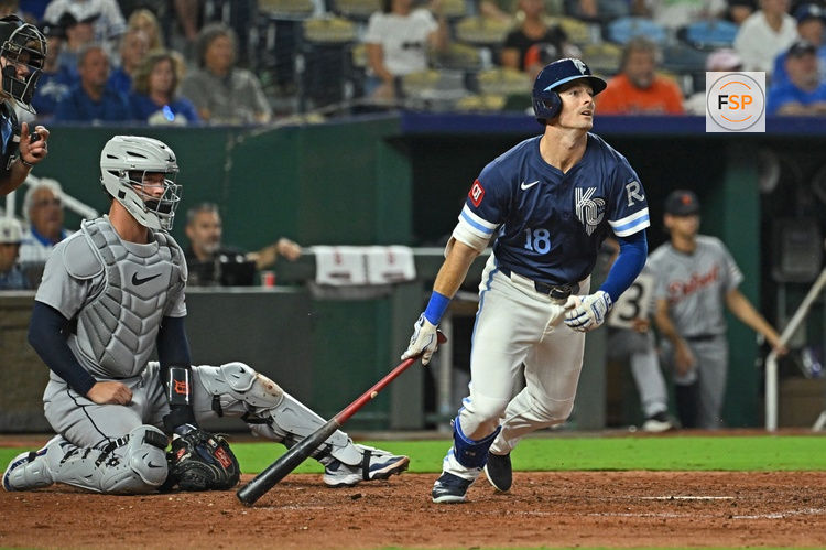 Aug 29, 2025; Kansas City, Missouri, USA;  Kansas City Royals right fielder Mike Yastrzemski (18) doubles in the seventh inning against the Detroit Tigers at Kauffman Stadium. Credit: Peter Aiken-Imagn Images