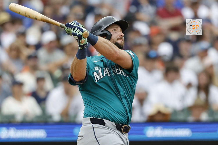 Jul 12, 2025; Detroit, Michigan, USA; Seattle Mariners catcher Cal Raleigh (29) hits a sacrifice fly in the third inning against the Detroit Tigers at Comerica Park. Credit: Rick Osentoski-Imagn Images