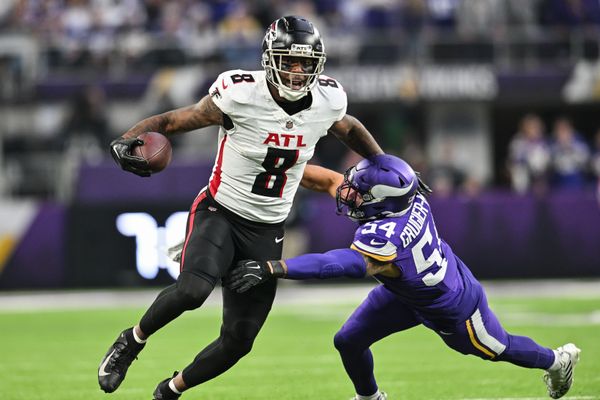 Dec 8, 2024; Minneapolis, Minnesota, USA; Atlanta Falcons tight end Kyle Pitts (8) gets yards after the catch as Minnesota Vikings linebacker Kamu Grugier-Hill (54) attempts to make the tackle during the fourth quarter at U.S. Bank Stadium. Mandatory Credit: Jeffrey Becker-Imagn Images