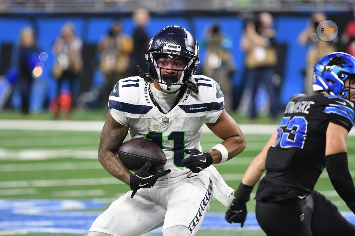 Sep 30, 2024; Detroit, Michigan, USA; Seattle Seahawks wide receiver Jaxon Smith-Njigba (11) runs the ball against the Detroit Lions in the third quarter at Ford Field. Credit: Eamon Horwedel-Imagn Images