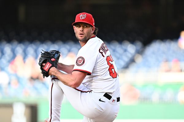 May 6, 2025; Washington, District of Columbia, USA;  Washington Nationals relief pitcher Kyle Finnegan (67) delivers a pitch during the ninth inning against the Cleveland Guardians at Nationals Park. Mandatory Credit: James A. Pittman-Imagn Images