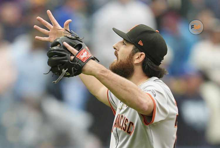 Sep 22, 2024; Kansas City, Missouri, USA; San Francisco Giants relief pitcher Ryan Walker (74) reacts after defeating the Kansas City Royals at Kauffman Stadium. Credit: Jay Biggerstaff-Imagn Images