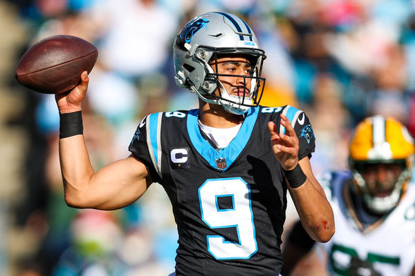 CHARLOTTE, NC - DECEMBER 24: Bryce Young #9 of the Carolina Panthers looks to pass the ball during an NFL game against the Green Bay Packers at Bank of America Stadium on December 24, 2023 in Charlotte, NC. (Photo by David Jensen/Icon Sportswire)