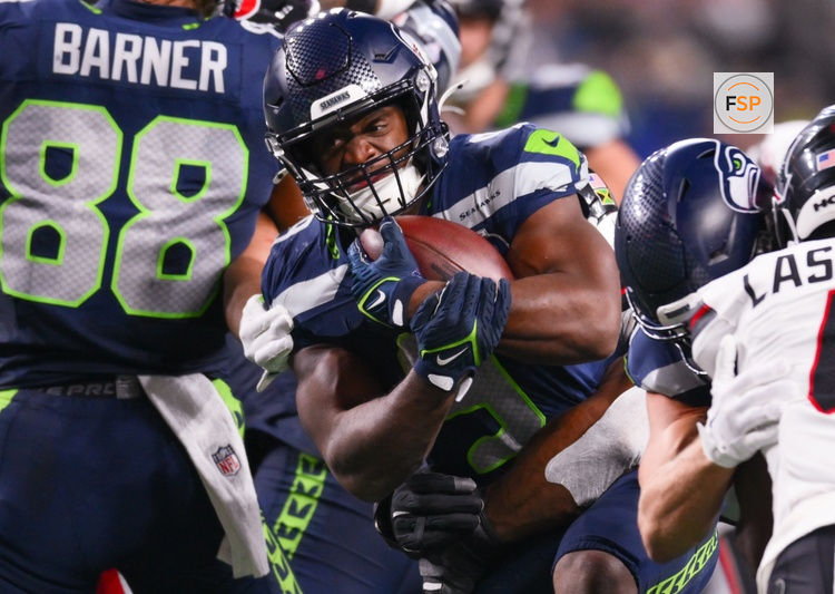 Oct 20, 2025; Seattle, Washington, USA; Seattle Seahawks running back Kenneth Walker III (9) runs the ball during the third quarter against the Houston Texans at Lumen Field. Credit: Steven Bisig-Imagn Images
