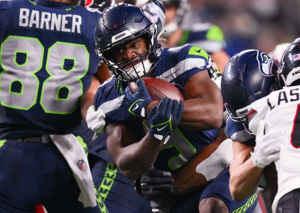 Oct 20, 2025; Seattle, Washington, USA; Seattle Seahawks running back Kenneth Walker III (9) runs the ball during the third quarter against the Houston Texans at Lumen Field. Mandatory Credit: Steven Bisig-Imagn Images