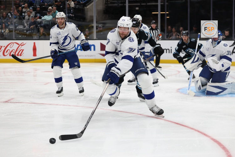 Nov 2, 2025; Salt Lake City, Utah, USA; Tampa Bay Lightning defenseman Victor Hedman (77) clears the puck against the Utah Mammoth during the third period at Delta Center. Credit: Rob Gray-Imagn Images