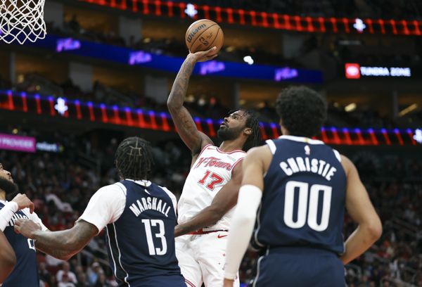 Jan 31, 2026; Houston, Texas, USA; Houston Rockets forward Tari Eason (17) shoots the ball during the second quarter against the Dallas Mavericks at Toyota Center. Mandatory Credit: Troy Taormina-Imagn Images