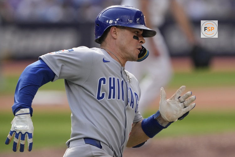 Aug 14, 2025; Toronto, Ontario, CAN; Chicago Cubs third baseman Matt Shaw (6) runs to first base on a double against the Toronto Blue Jays during the eighth inning at Rogers Centre. Credit: John E. Sokolowski-Imagn Images