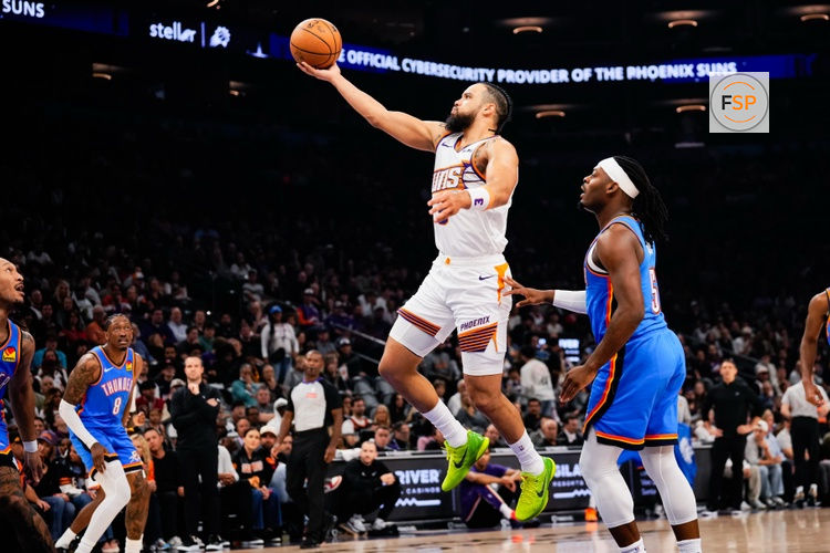 Feb 11, 2026; Phoenix, Arizona, USA; Phoenix Suns guard/forward Dillon Brooks (3) goes for a shot against Oklahoma City Thunder guard Luguentz Dort (5)during the first half of the game at Mortgage Matchup Center. Credit: Arianna Grainey-Imagn Images
