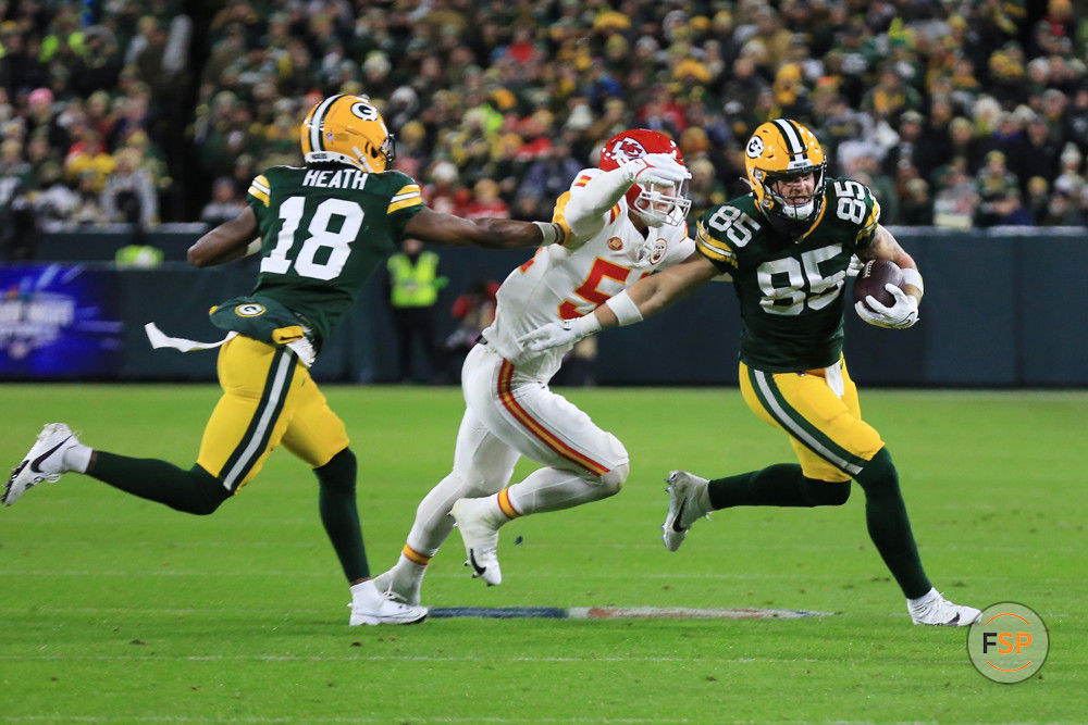 GREEN BAY, WI - DECEMBER 03: Green Bay Packers tight end Tucker Kraft (85) runs with the ball during a game between the Green Bay Packers and the Kansas City Chiefs at Lambeau Field on December 3, 2023 in Green Bay, WI. (Photo by Larry Radloff/Icon Sportswire)