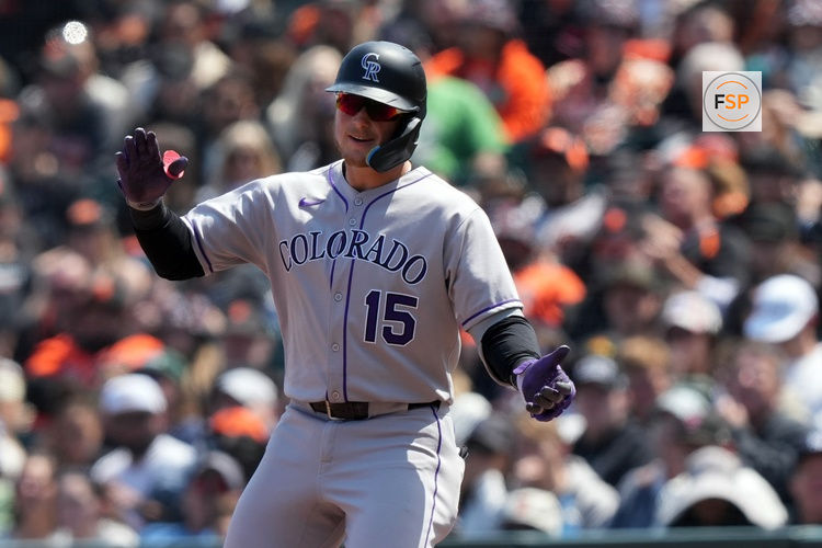 May 3, 2025; San Francisco, California, USA; Colorado Rockies catcher Hunter Goodman (15) reacts after hitting an RBI-single against the San Francisco Giants during the sixth inning at Oracle Park. Credit: Darren Yamashita-Imagn Images