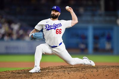 Jul 8, 2026; Los Angeles, California, USA; Los Angeles Dodgers pitcher Tanner Scott (66) throws against the Colorado Rockies during the ninth inning at Dodger Stadium. Mandatory Credit: Gary A. Vasquez-Imagn Images