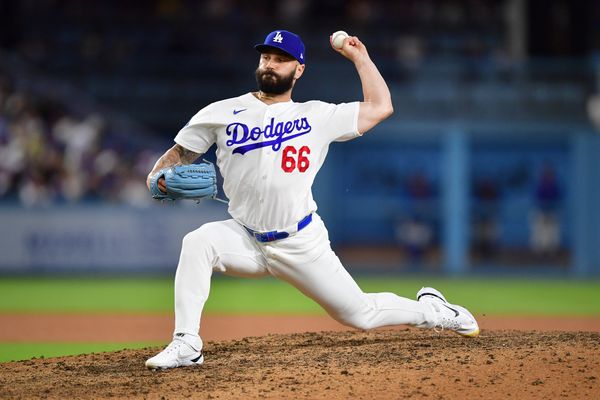Jul 8, 2026; Los Angeles, California, USA; Los Angeles Dodgers pitcher Tanner Scott (66) throws against the Colorado Rockies during the ninth inning at Dodger Stadium. Mandatory Credit: Gary A. Vasquez-Imagn Images