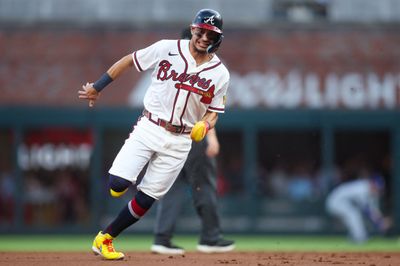 Aug 25, 2026; Atlanta, Georgia, USA; Atlanta Braves shortstop Mauricio Dubon (14) runs to third against the Los Angeles Dodgers in the first inning at Truist Park. Mandatory Credit: Brett Davis-Imagn Images
