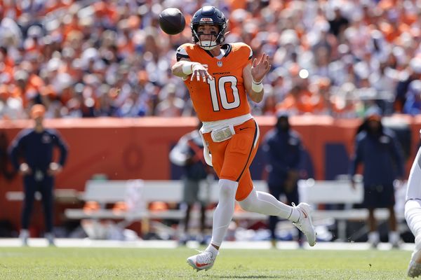 Sep 7, 2025; Denver, Colorado, USA; Denver Broncos quarterback Bo Nix (10) drops back to pass against the Tennessee Titans in the first half at Empower Field at Mile High. Mandatory Credit: Isaiah J. Downing-Imagn Images