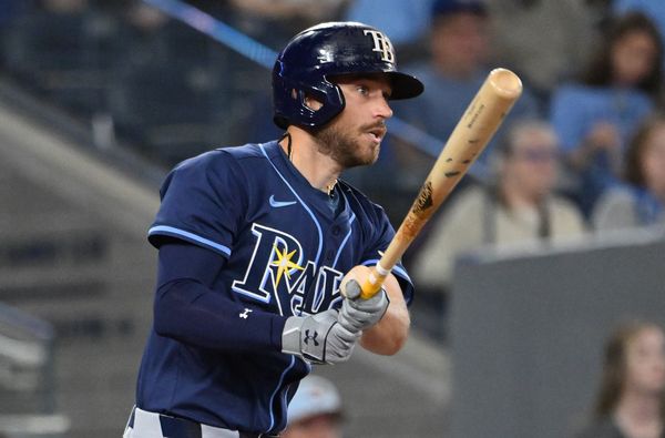 May 14, 2025; Toronto, Ontario, CAN;  Tampa Bay Rays second baseman Brandon Lowe (8) hits a single against the Toronto Blue Jays in the fifth inning at Rogers Centre. Mandatory Credit: Dan Hamilton-Imagn Images