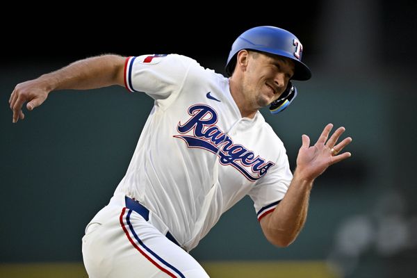 Apr 6, 2026; Arlington, Texas, USA; Texas Rangers left fielder Wyatt Langford (36) scores from second base during the first inning against the Seattle Mariners at Globe Life Field. Mandatory Credit: Jerome Miron-Imagn Images