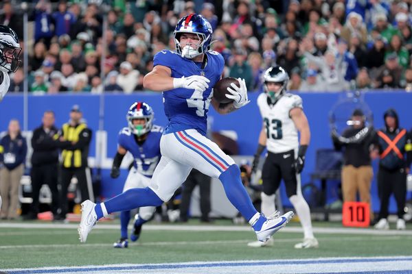Oct 9, 2025; East Rutherford, New Jersey, USA; New York Giants running back Cam Skattebo (44) scores a touchdown against the Philadelphia Eagles during the second quarter at MetLife Stadium. Mandatory Credit: Brad Penner-Imagn Images