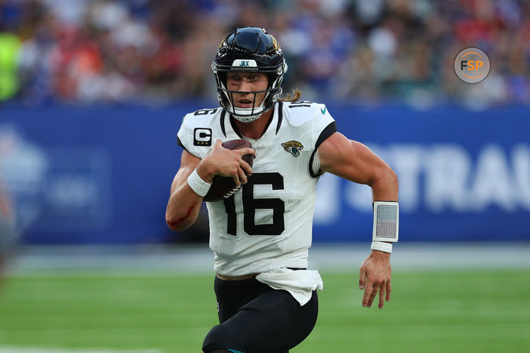 LONDON, ENGLAND - OCTOBER 8:  Jacksonville Jaguars quarterback Trevor Lawrence running with the ball. during the NFL International Series game between the Jacksonville Jaguars and the Buffalo Bills on October 08, 2023, at Tottenham Hotspur Stadium in London, England. (Photo by Katie Chan/Action Plus/Icon Sportswire) ****NO AGENTS---NORTH AND SOUTH AMERICA SALES ONLY****NO AGENTS---NORTH AND SOUTH AMERICA SALES ONLY****