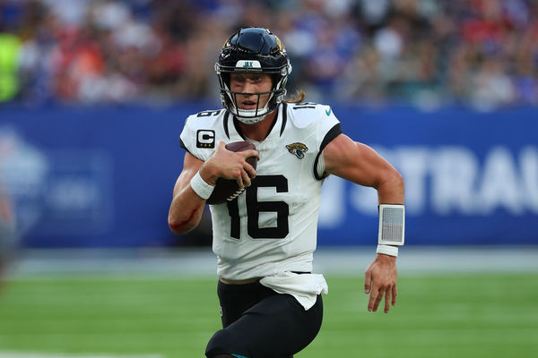 LONDON, ENGLAND - OCTOBER 8:  Jacksonville Jaguars quarterback Trevor Lawrence running with the ball. during the NFL International Series game between the Jacksonville Jaguars and the Buffalo Bills on October 08, 2023, at Tottenham Hotspur Stadium in London, England. (Photo by Katie Chan/Action Plus/Icon Sportswire) ****NO AGENTS---NORTH AND SOUTH AMERICA SALES ONLY****NO AGENTS---NORTH AND SOUTH AMERICA SALES ONLY****