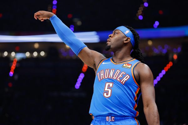 May 18, 2026; Oklahoma City, Oklahoma, USA; Oklahoma City Thunder forward Luguentz Dort (5) shoots in the third quarter against the San Antonio Spurs during game one of the western conference finals for the 2026 NBA playoffs at Paycom Center. Mandatory Credit: Alonzo Adams-Imagn Images