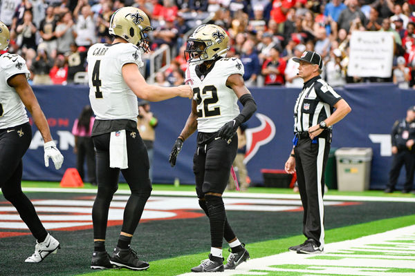 HOUSTON, TX - OCTOBER 15: New Orleans Saints quarterback Derek Carr (4) congratulates New Orleans Saints wide receiver Rashid Shaheed (22) after their first half hookup for a touchdown pass and reception during the football game between the New Orleans Saints and Houston Texans at NRG Stadium on October 15, 2023, in Houston, Texas. (Photo by Ken Murray/Icon Sportswire)